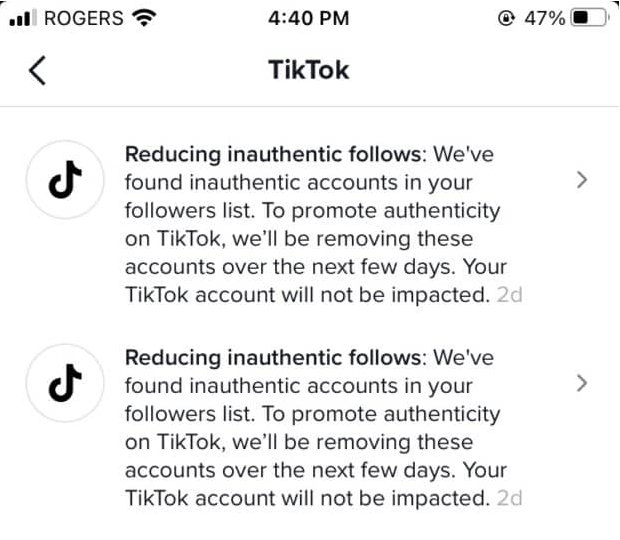 TikTok app notification about removing inauthentic followers.